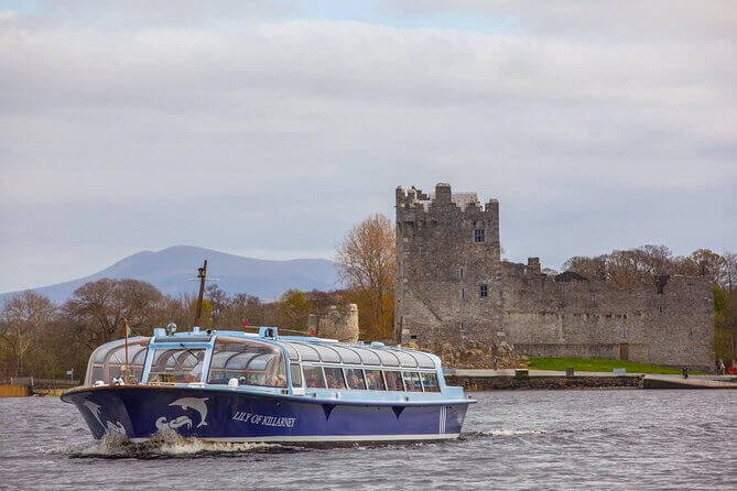 tour boat, named Lily of Killarney, on Lough Leane, in front of Ross Castle